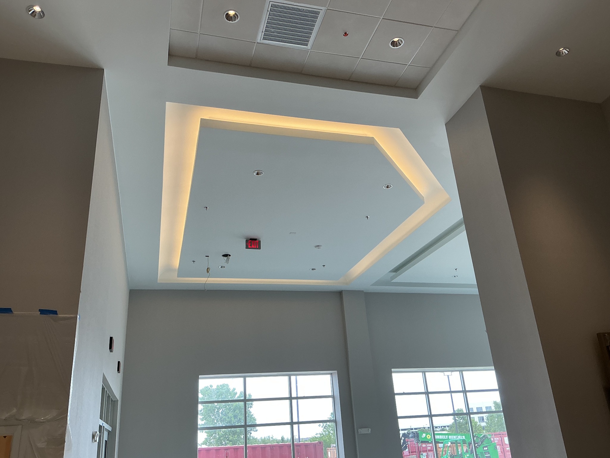 Finished drywall ceiling with a recessed illuminated detail